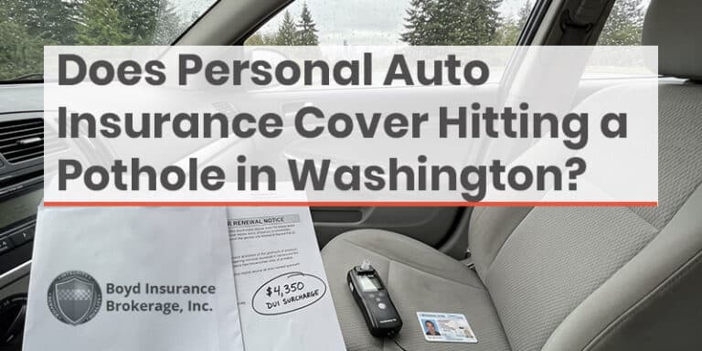 Inside a car showing a car key, insurance card, and a paper with Boyd Insurance Brokerage logo, illustrating auto insurance coverage in Washington.