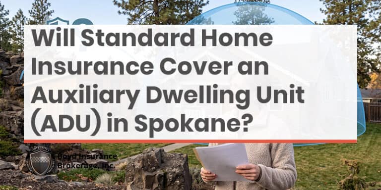Question about whether standard home insurance in Spokane covers an auxiliary dwelling unit (ADU) with a person holding a tablet.